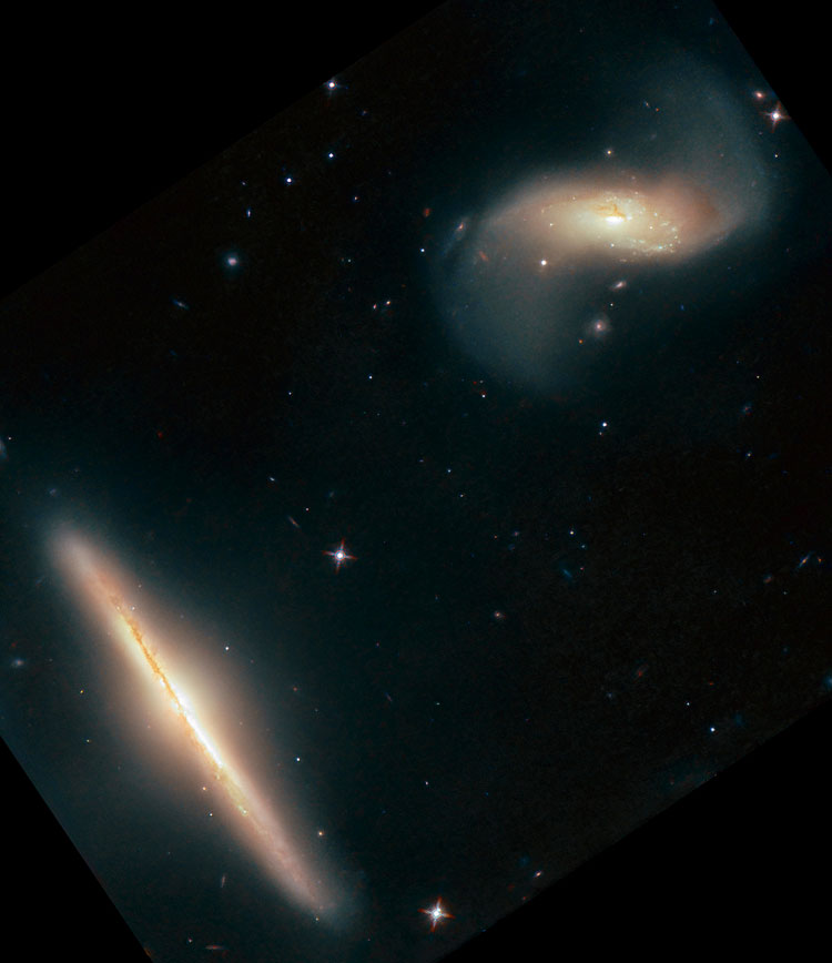 HST image of spiral galaxies NGC 6285 and NGC 6286, which comprise Arp 293