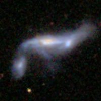 Arp 63 (NGC 2944 + PGC 1990710)