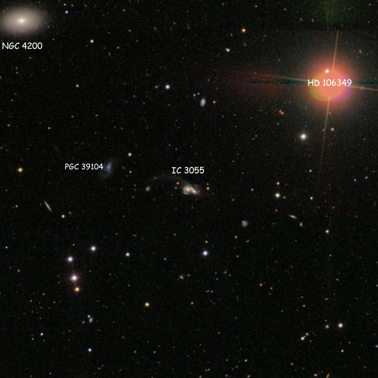 SDSS image of the interacting triplet of galaxies listed as IC 3055, also showing dwarf irregular galaxy PGC 30914, which is sometimes misidentified as IC 3055, and lenticular galaxy NGC 4200