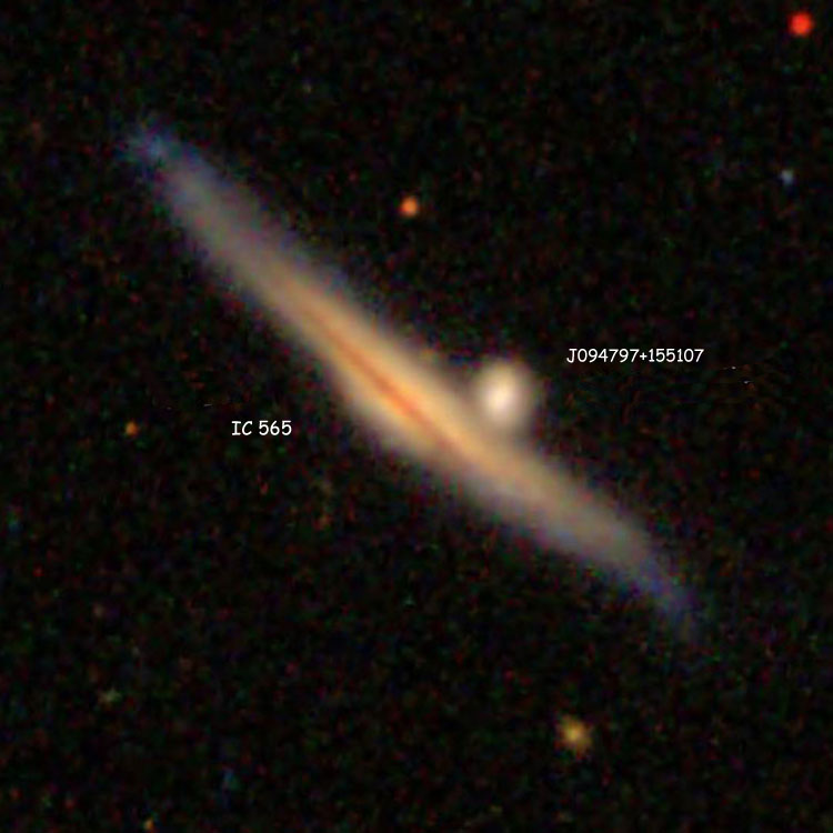 SDSS image of spiral galaxy IC 565 and its apparent elliptical companion