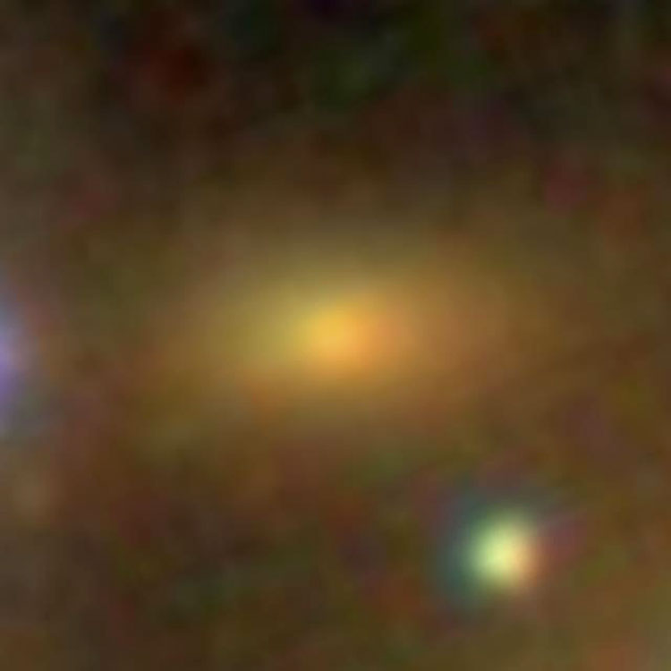SDSS image of elliptical galaxy J181944.8+234259, an apparent neighbor of NGC 6623