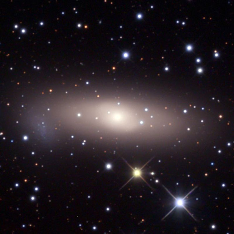 HST image of lenticular galaxy NGC 1023 and its apparent companion, PGC 10139 (also called NGC 1023A), which comprise Arp 135