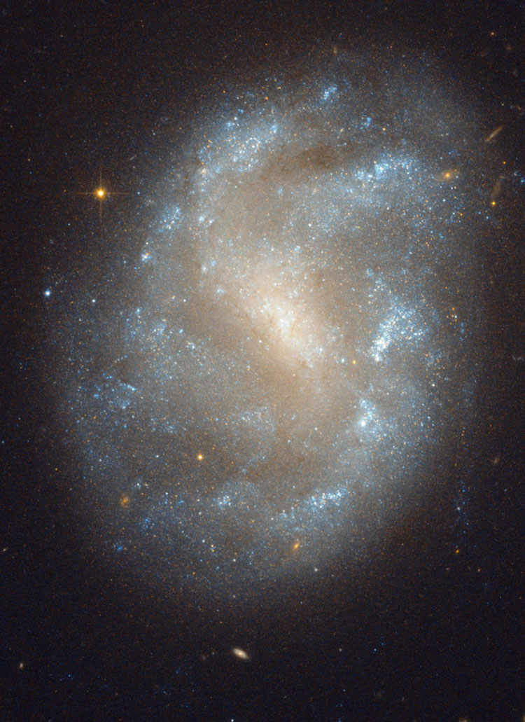 HST image of spiral galaxy NGC 1483 rotated with North on upper left to allow for greater detail