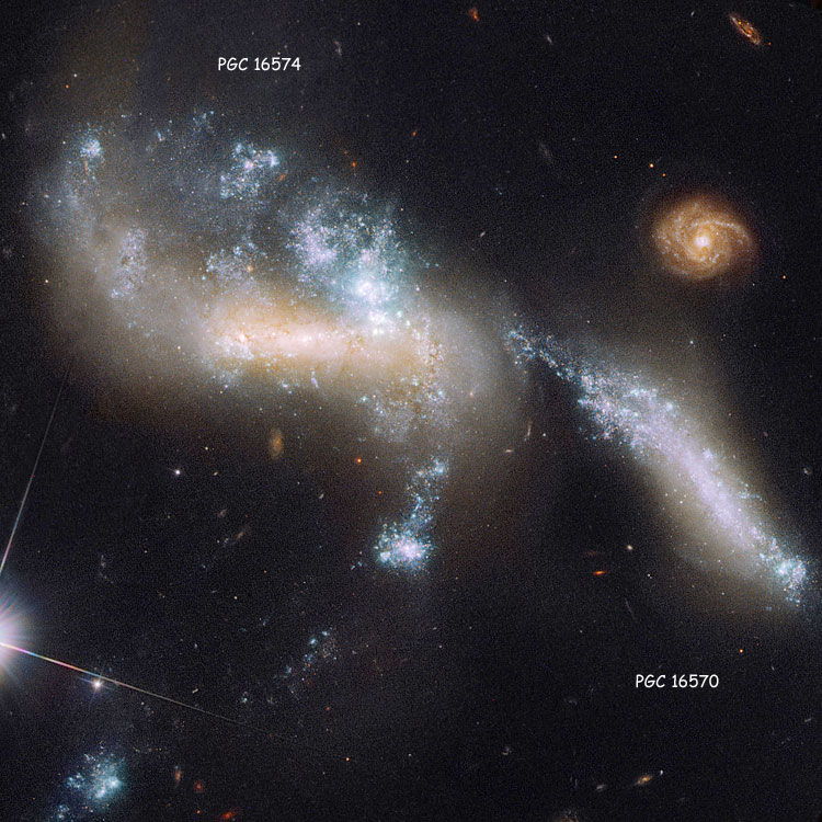 HST image of PGC 16570 and PGC 16574, the pair of interacting galaxies listed as NGC 1741, also known as Arp 259, and as part of Hickson Compact Group 31