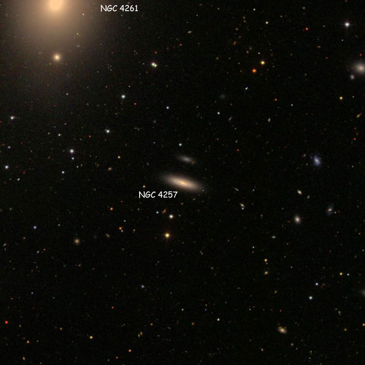 SDSS image of region near spiral galaxy NGC 4257, also showing elliptical galaxy NGC 4261