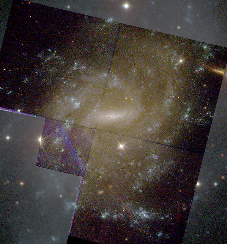 Superposition of a 'raw' HST image of part of spiral galaxy NGC 5556 on a Carnegie-Irvine Galaxy Survey image of the galaxy