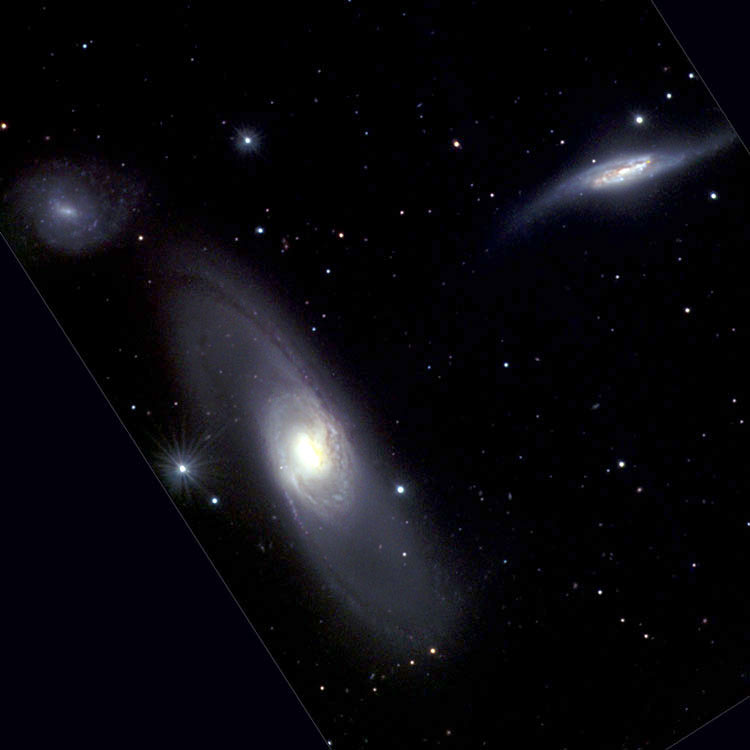 NOAO image of spiral galaxies NGC 5560, 5566 and 5569, also known as Arp 286