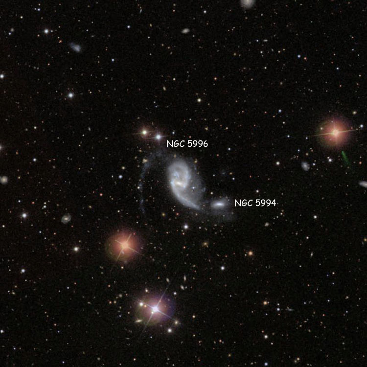 SDSS image of region near spiral galaxies NGC 5994 and 5996, which comprise Arp 72; slightly post-processed to hint at the fainter regions