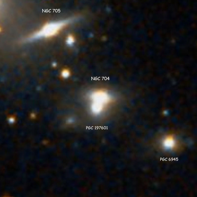 DSS image of lenticular galaxy NGC 704 and its apparent companion, PGC 197601; also shown are NGC 705 and PGC 6945