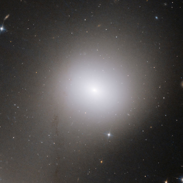 HST image of elliptical galaxy NGC 7173, a member of Hickson Compact Group 90, also showing part of the northern extension of NGC 7174