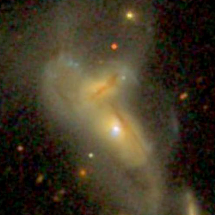 SDSS image of the the central portion of the interacting pair of peculiar spiral galaxies listed as NGC 7212, also showing part of their apparent companion, 2MASS J22070015+1013286