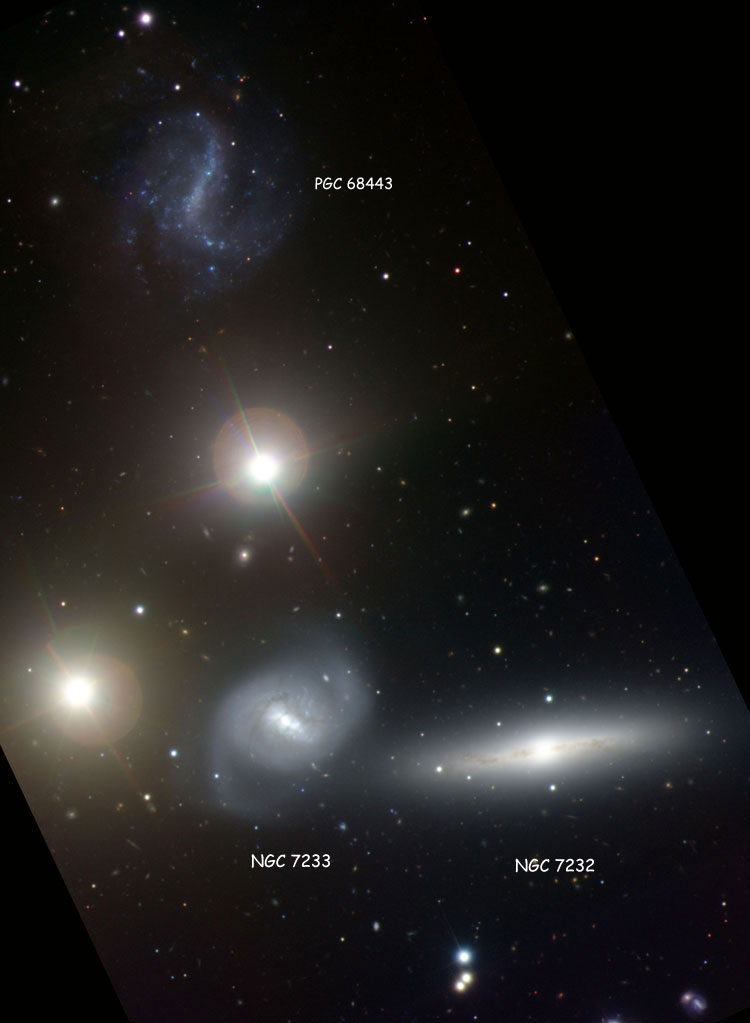 NOIRLab image of spiral galaxy NGC 7232, also showing NGC 7233 and PGC 68443