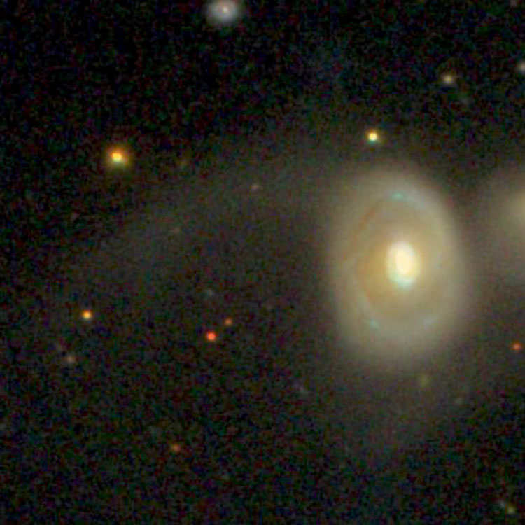 SDSS image of spiral galaxy NGC 835 and part of NGC 833, emphasizing their faint outer regions