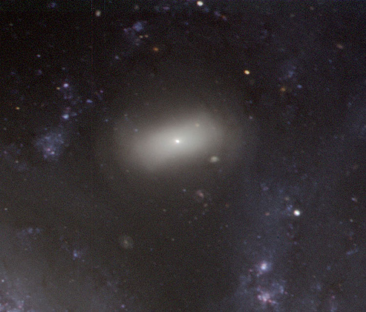 ESO closeup of lenticular galaxy PGC 10479, also known (with spiral galaxy NGC 1097) as Arp 77