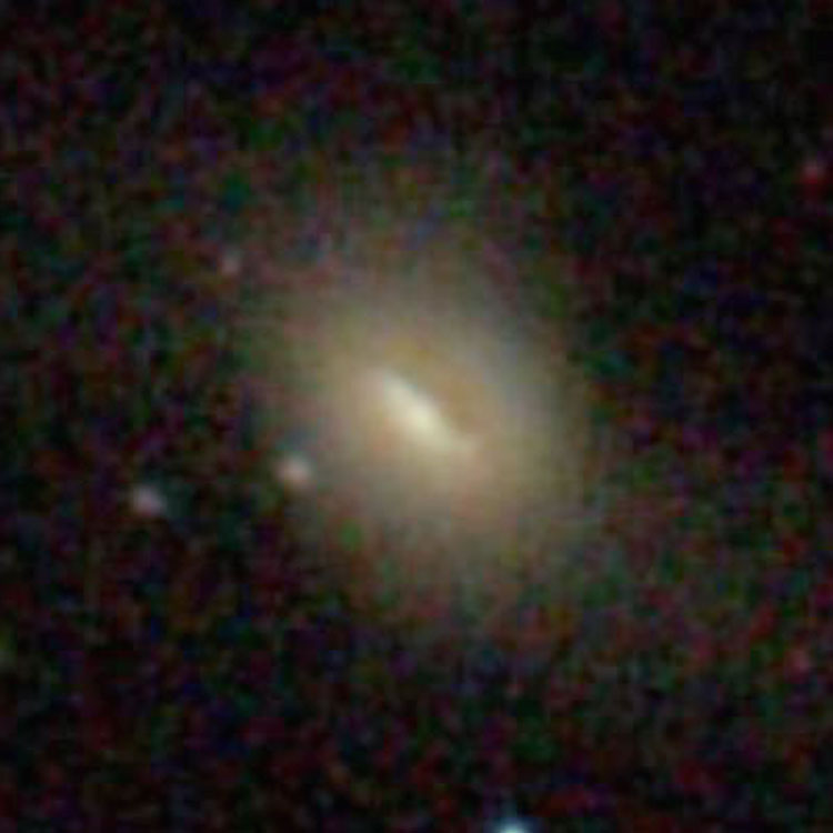 SDSS image of spiral galaxy PGC 1127439, which is probably interacting with NGC 1194