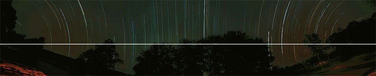 Panoramic image showing the stars setting on the western horizon at the Equator, in Kenya