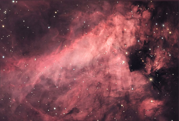 NOAO image of emission nebula and open cluster NGC 6618, also known as M17, or as the Swan Nebula, or the Omega Nebula
