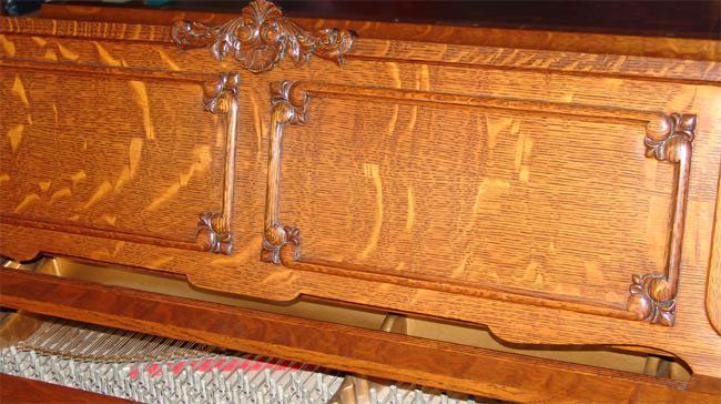 The music holder of my Starr piano, showing the flame pattern typical of quarter-sawn oak