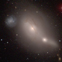 Arp 176, or NGC 4933 + IC 4173