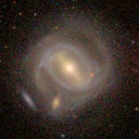 Arp 67 (PGC 4906 + J012117.4-003312)
