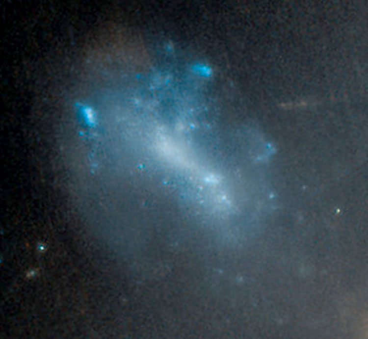 HST image of spiral galaxy Abell 1656 GMP 4475, a possible interacting companion of NGC 4848