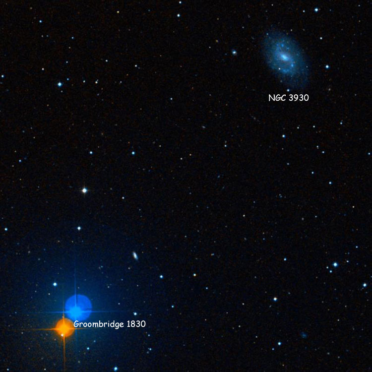 A composite DSS image showing spiral galaxy NGC 3930 and the rapid proper-motion star Groombridge 1830. The red and blue DSS images were taken on different dates, so the star is shown as apparently two separate stars, one from the red plate and the other from the blue plate.