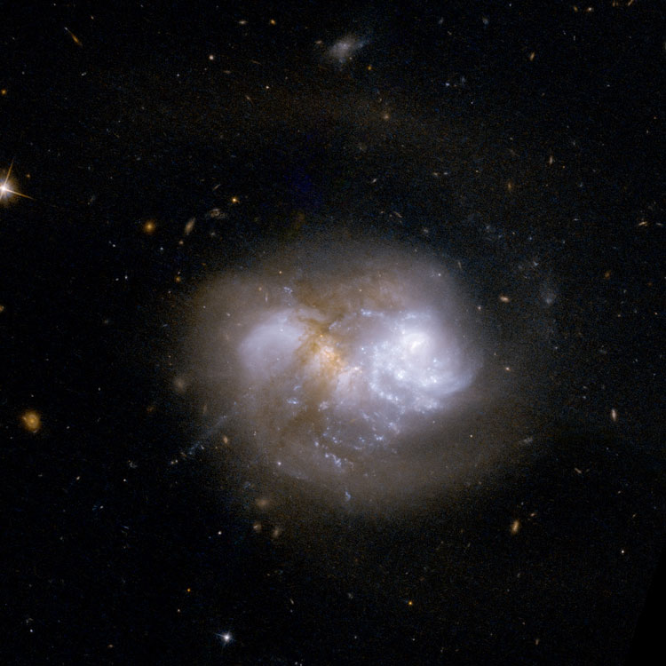 HST image of irregular galaxies PGC 4007 and PGC 4008, the interacting pair of galaxies that comprise IC 1623, also known as Arp 236