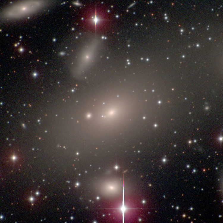 Carnegie-Irvine Galaxy Survey image of elliptical galaxy IC 4765, also showing IC 4766 and some of its nearer companions