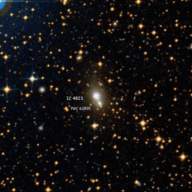 DSS image of region near lenticular galaxy IC 4823, also showing its companion, lenticular galaxy PGC 62891