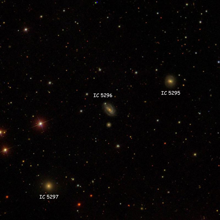 SDSS image of region near spiral galaxy IC 5296, also showing IC 5295 and IC 5297