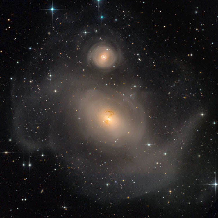 Martin Pugh Astrophotography image of peculiar lenticular galaxy NGC 1316, showing its outermost regions; also shown is NGC 1317