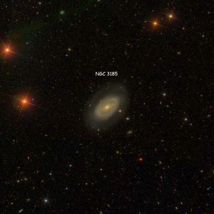 SDSS image of region near spiral galaxy NGC 3185, a member of Hickson Compact Group 44