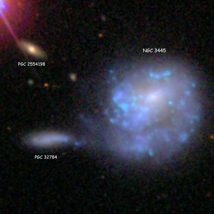 SDSS image of NGC 3445, which is Arp 24, also showing spiral/irregular galaxy PGC 32784 and PGC 2554198