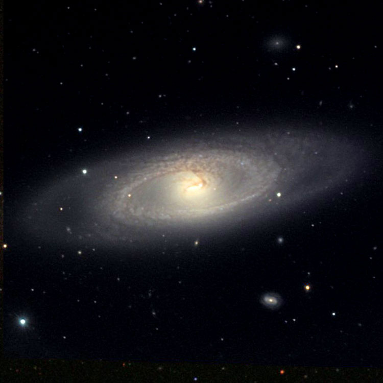 NOAO image of spiral galaxy NGC 4274 overlaid on the SDSS image above to fill in missing areas