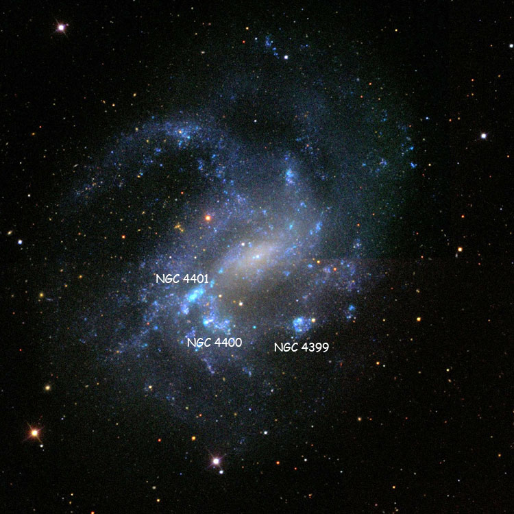 Labeled SDSS image of spiral galaxy NGC 4395, showing emission regions NGC 4399, 4400 and 4401