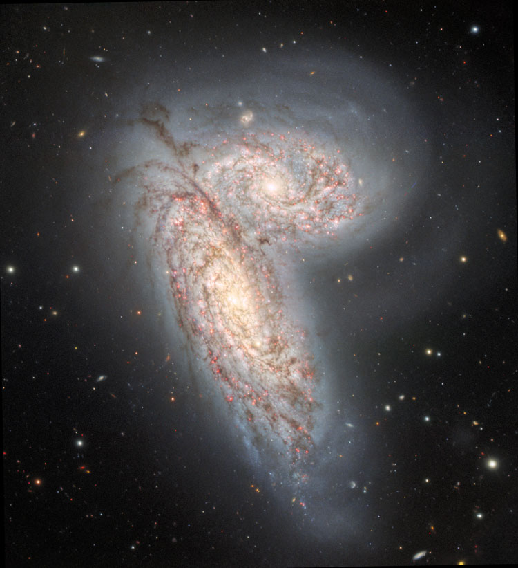 NOIRLab/Gemini Observatory image of the pair of interacting spiral galaxies, NGC 4567 and 4568