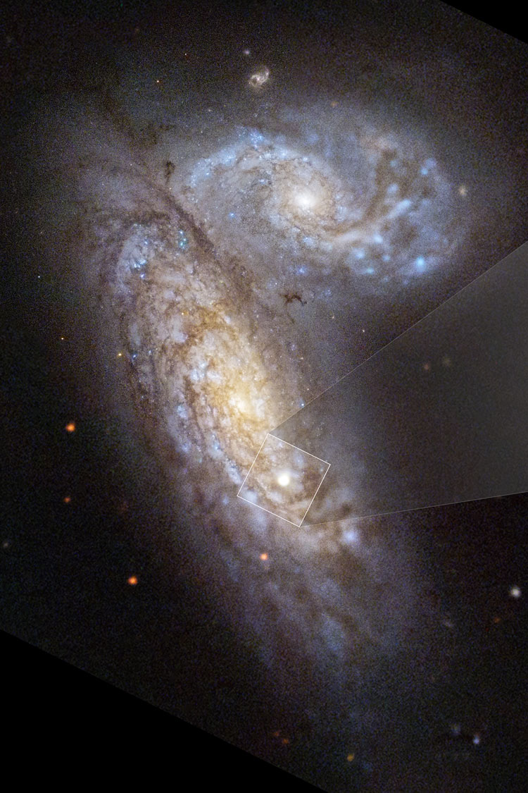 HST image of spiral galaxy NGC 4567, one of the Siamese Twins