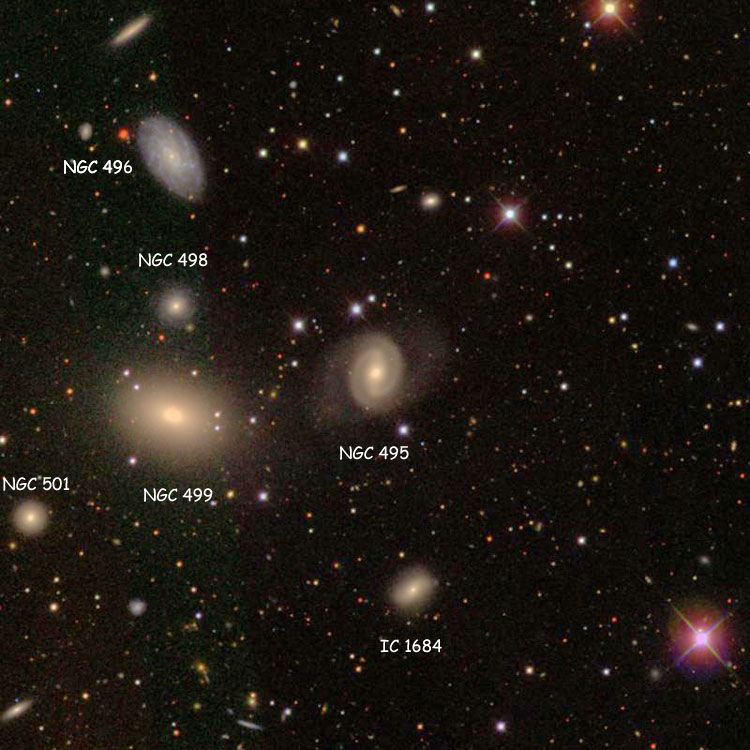 SDSS image of region near spiral galaxy NGC 495, enhanced to show its faint outer extensions, also showing NGC 496, NGC 498, NGC 499, NGC 501 and IC 1684