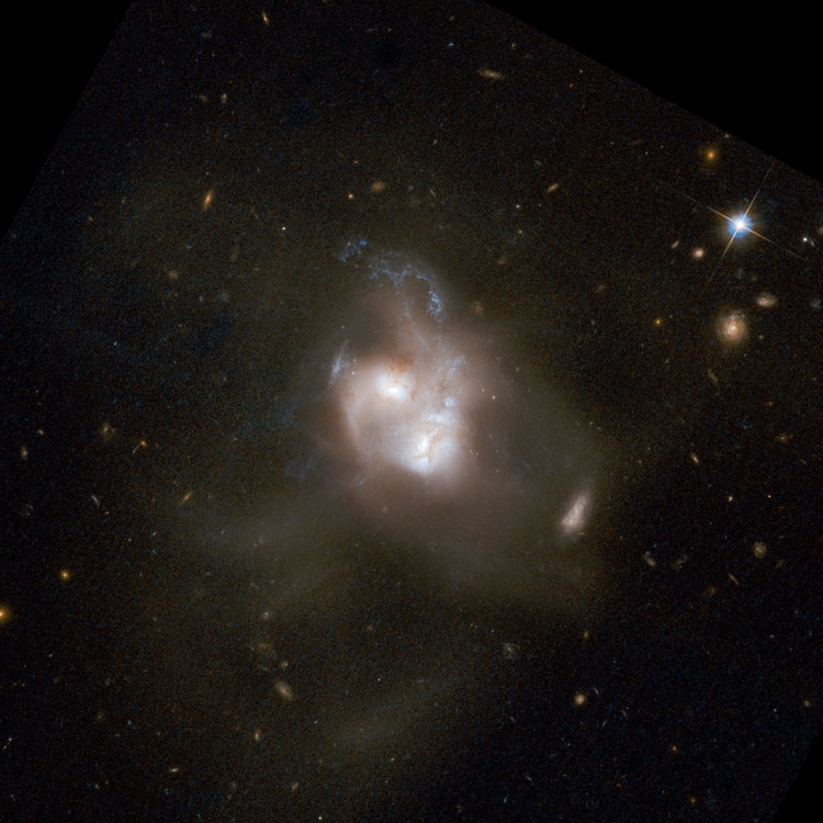 Older HST image the double galaxy NGC 5256 and the extended remnants of their collision