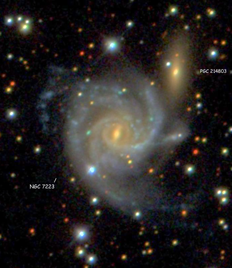 SDSS image of spiral galaxy NGC 7223 and its probable companion, PGC 214803