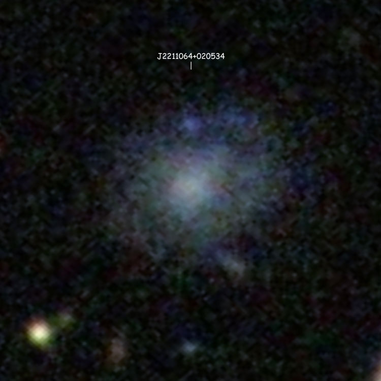 PanSTARRS image of [DD2013] W4-1+1 71254, a spiral galaxy that appears to be a companion of PGC 68229 but is actually a much more distant background galaxy