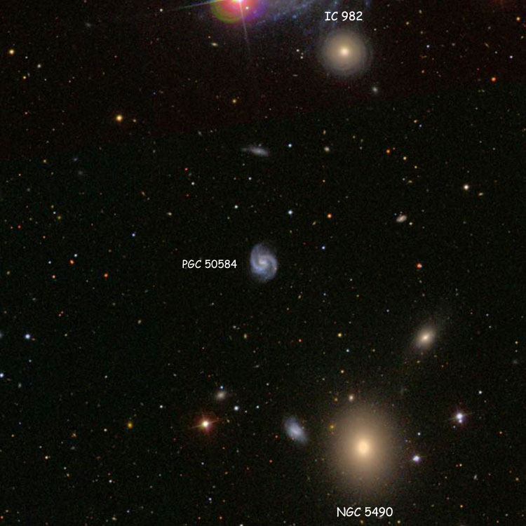 SDSS image of region near spiral galaxy PGC 50584, also known as Arp 79, and sometimes called NGC 5490C; also shown are elliptical galaxy NGC 5490 and lenticular galaxy IC 982