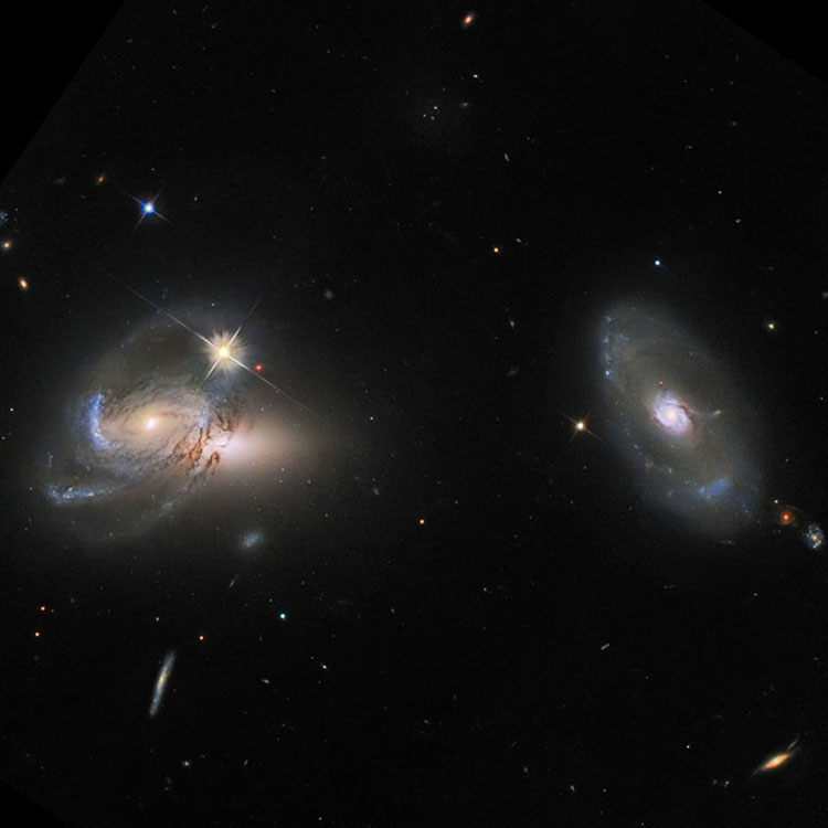 HST image of the single spiral galaxy incorrectly designated PGC 58109 by HST and SIMBAD, and the pair of galaxies correctly designated as PGC 58109 by HyperLEDA and NED