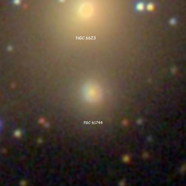 SDSS image of lenticular galaxy PGC 61744, a background galaxy often misidentified as a pair with NGC 6623, which is also shown at the top of the image
