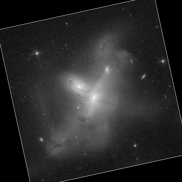 HST image of Arp-Madore 2115-273 (= PGC 66528 + PGC 66529) enhanced to show faint material scattered by the interacting galaxies