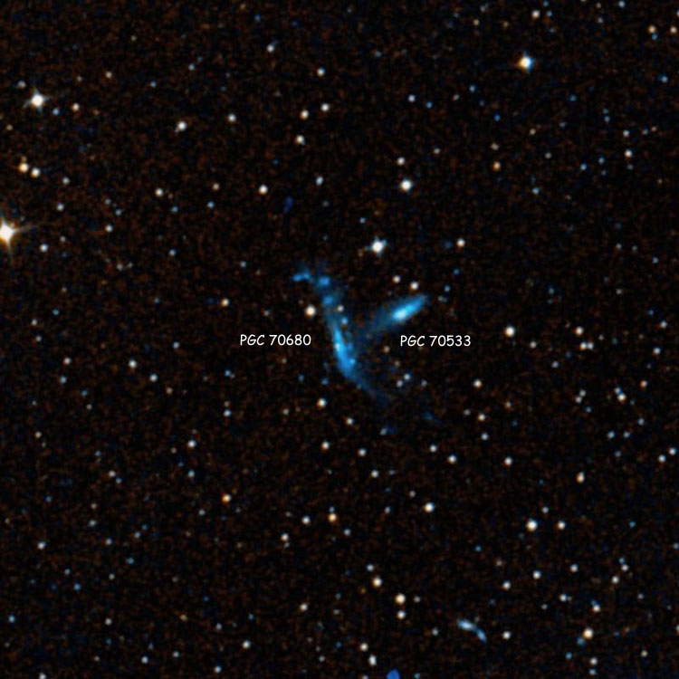 DSS image of region near spiral galaxy PGC 70680, sometimes called NGC 2573A, and PGC 70533, sometimes called NGC 2573B