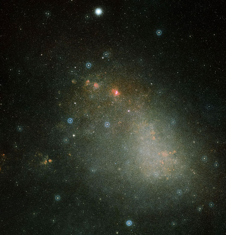 DSS image of spiral galaxy NGC 292, the Small Magellanic Cloud, altered by using the HST color palette