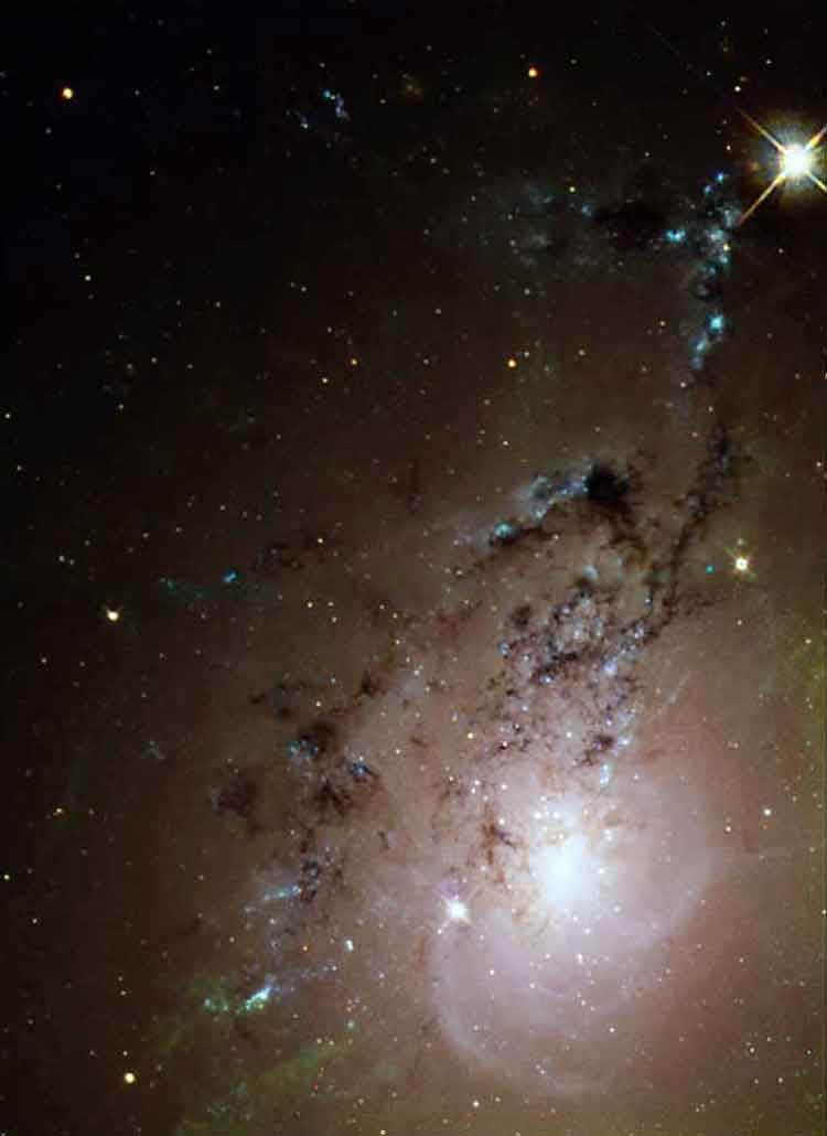 HST image of a portion of the colliding pair of galaxies listed as NGC 1275, and also known as radio source Perseus A