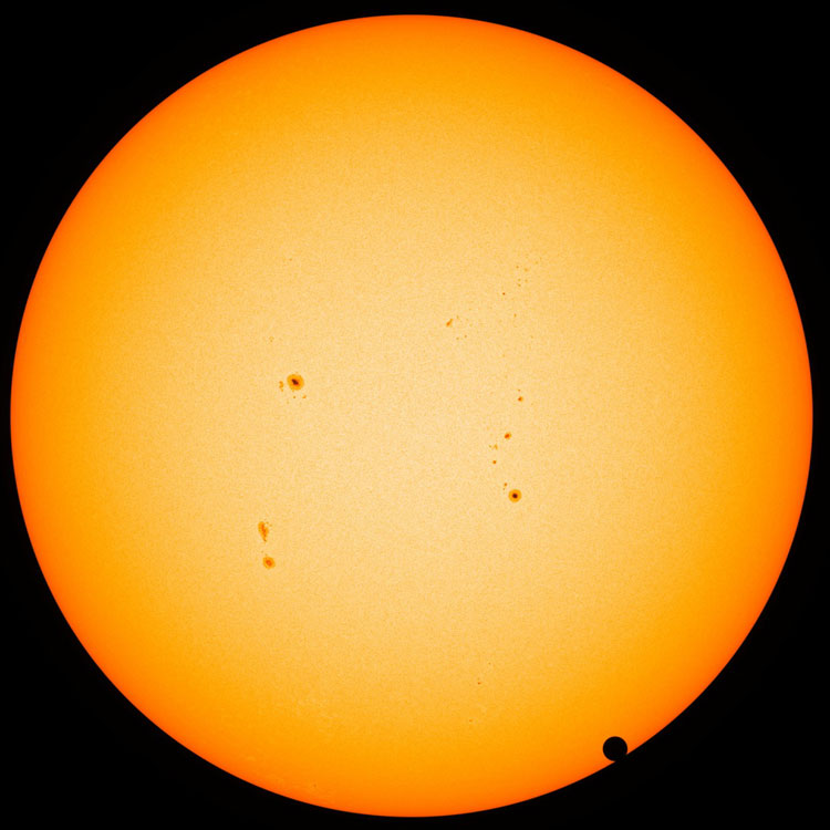 Solar Dynamics Orbiting Observatory image of Venus passing in front of the solar disk just before the end of its transit on June 5, 2012