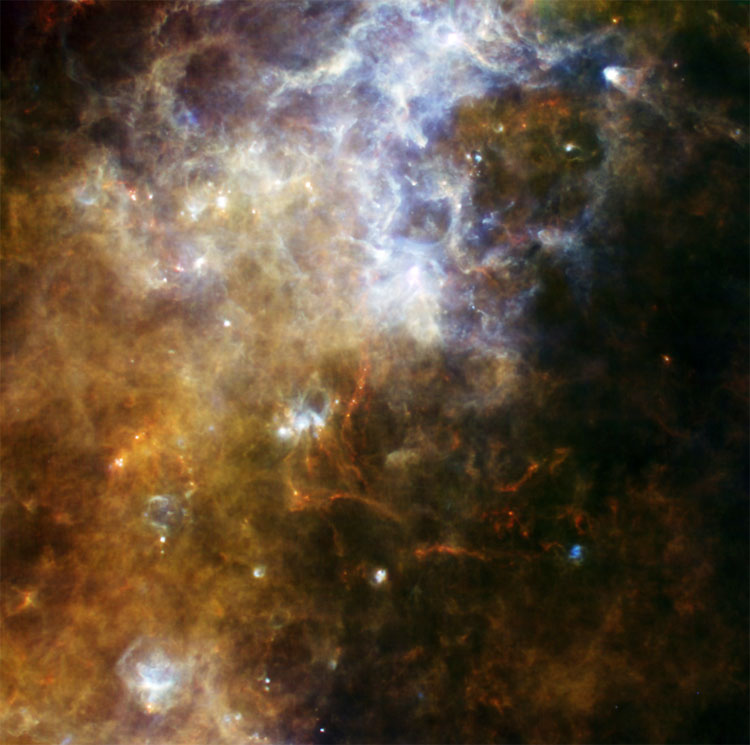 Herschel telescope false-color composite image of far infrared radiation in the southern Milky Way, near the Southern Cross